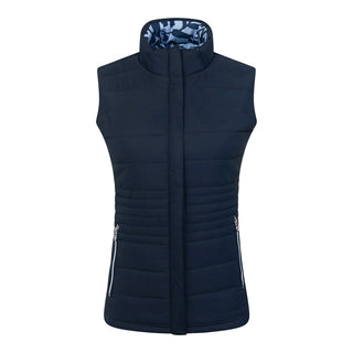 Pure Golf Eve reversible ladies gilet for golf is insulated, winter-weight, patterned and reversible. It has been Insulated for warmth without being bulky. One side features intricate Midnight Rose floral prints in navy and powder blue, while the other offers a classic plain navy option for versatility of wear. It has pockets on both sides and two-way zippers. The flattering quilting style and fit enhances your silhouette. 