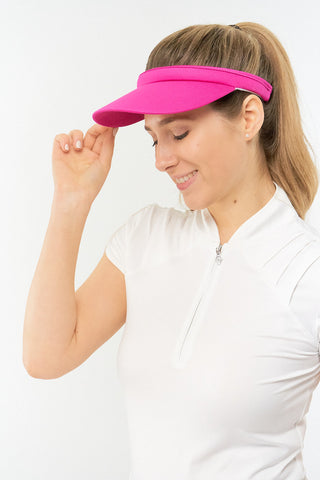 Hot Pink Clip ladies golf visor constructed with quick-drying fabrics. The visor comes in a one size fits all design which clips around your head to hold it securely in place. It also features a concealed magnet  in peak with a hand enamelled lace effect golf ball marker attached, making it a lovely golf accessory, golf gift! The headband features a soft lined absorbent towel. 