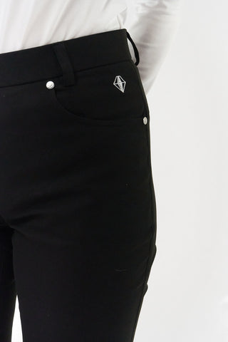 Ladies golf trousers made from flexible lightweight 4 way stretch material.  Featuring a zip and button fastening with five belt loops, a regular fit with anti-crease and anti-static properties. These women's golf trousers have two open pockets to the front and back. Size 8 to 20.