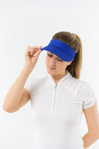 Royal Blue  ladies golf visor constructed with quick-drying fabrics. The visor comes in a one size fits all design with an elasticated cord at the rear to hold it securely in place. It also features a concealed magnet  in peak with a hand enamelled lace golf ball marker attached, making it a lovely golf accessory, golf gift! The headband features a soft lined absorbent towel. 