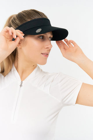 Black ladies golf visor constructed with quick-drying fabrics. The visor comes in a one size fits all design with an elasticated cord at the rear to hold it securely in place. It also features a concealed magnet  in peak with a hand enamelled lace golf ball marker attached, making it a lovely golf accessory, golf gift! The headband features a soft lined absorbent towel. 