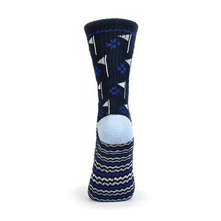 Ladies Navy Golf Crew Sock has a trendy golf flag design with lurex stripe detailing on the sole. Made from a soft, stretchy cotton blend fabric allowing breathability, with a cushioned sole, compression fit and Rib cuff for a snug fit. They are suited to UK sizes between 4 and 7. 85% Cotton, 13% Polyester, 2% Elastane.